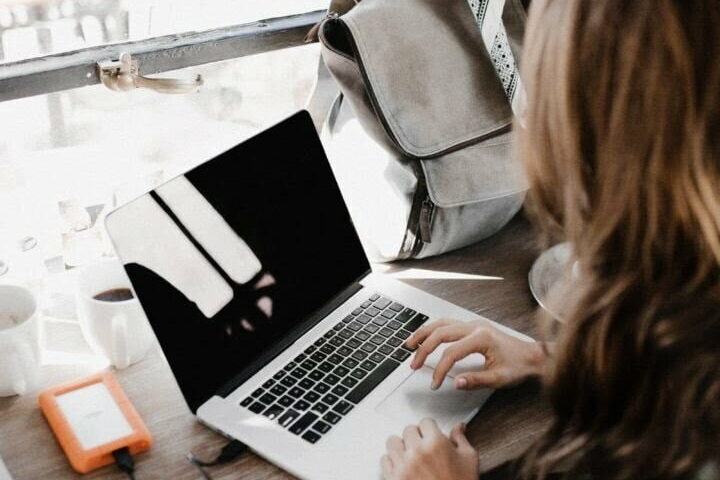 typing on laptop
