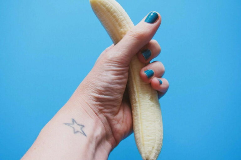 Holding a banana