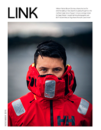november link magazine cover - guy standing in red jacket