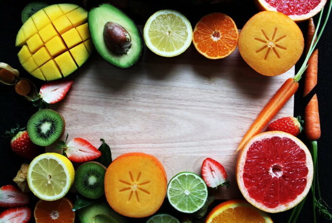 amoon-ra-oWN1tKuUpJI-unsplash Fruit on cutting board
