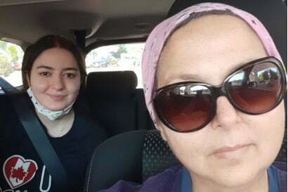 Two women smiling at the camera