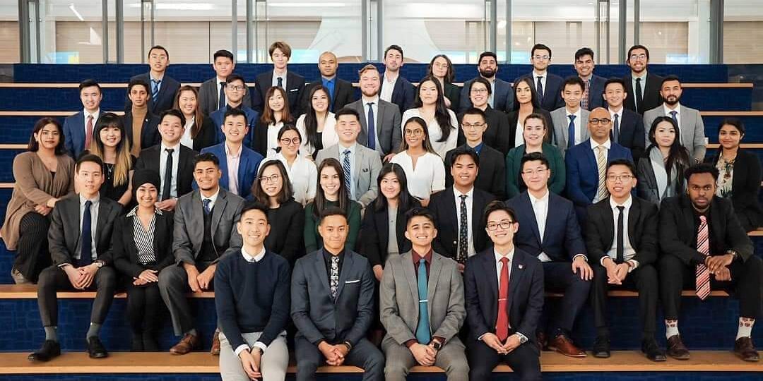 JDC delegates sitting on bleachers