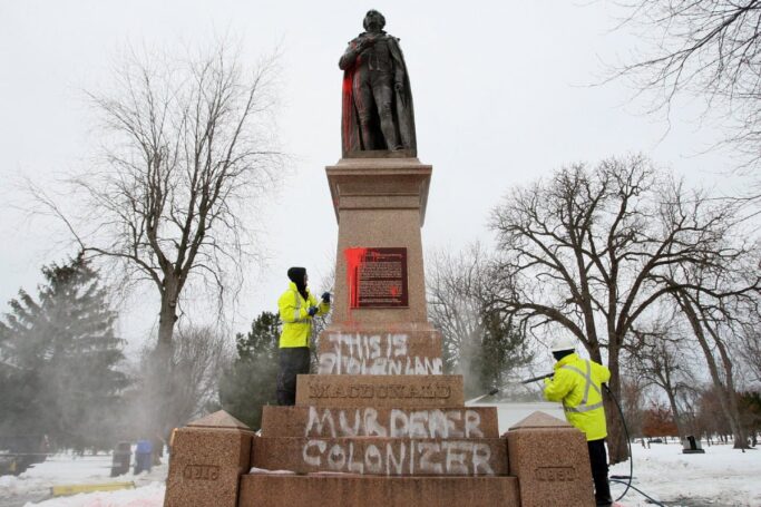 The John A Macdonald Statue in Montreal, covered with the message of those hurt by his legacy