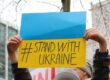 A stand with Ukraine sign