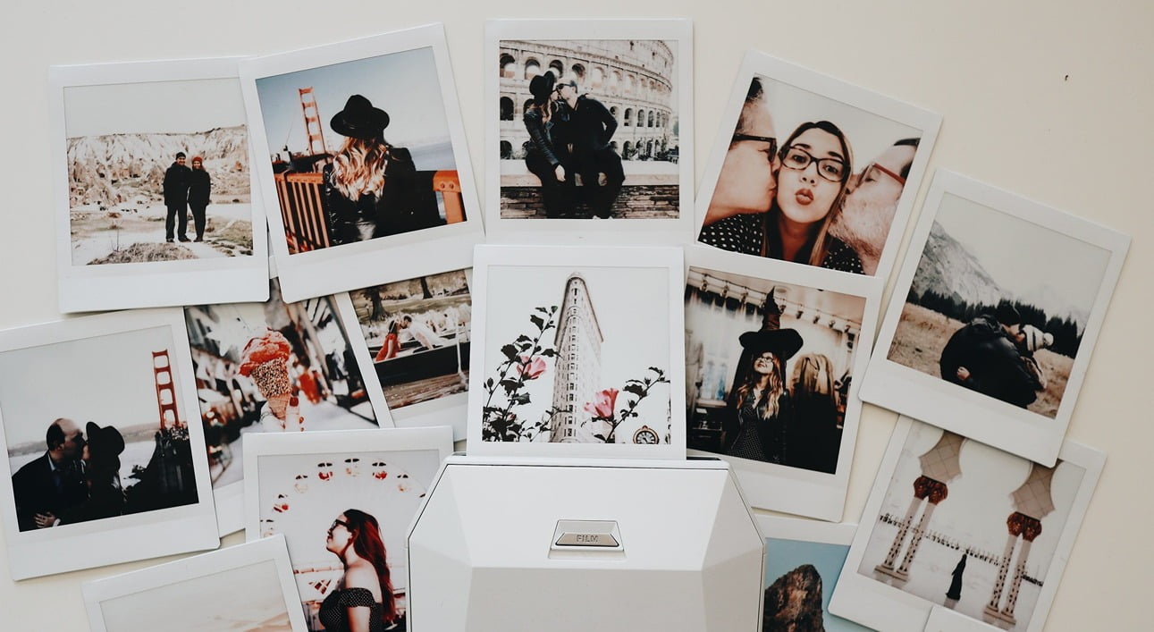 lots of polaroids of a man and woman